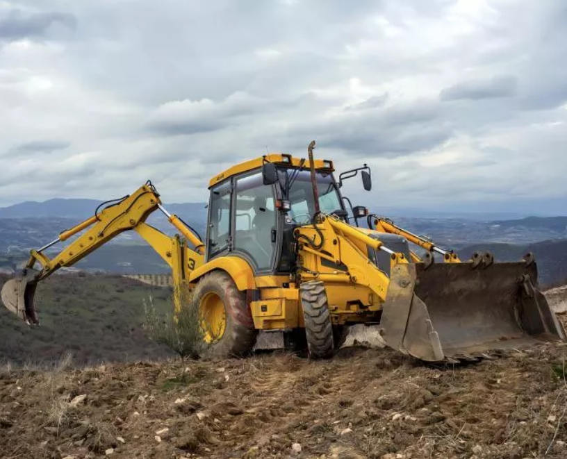 How many cylinders are in a backhoe loader?